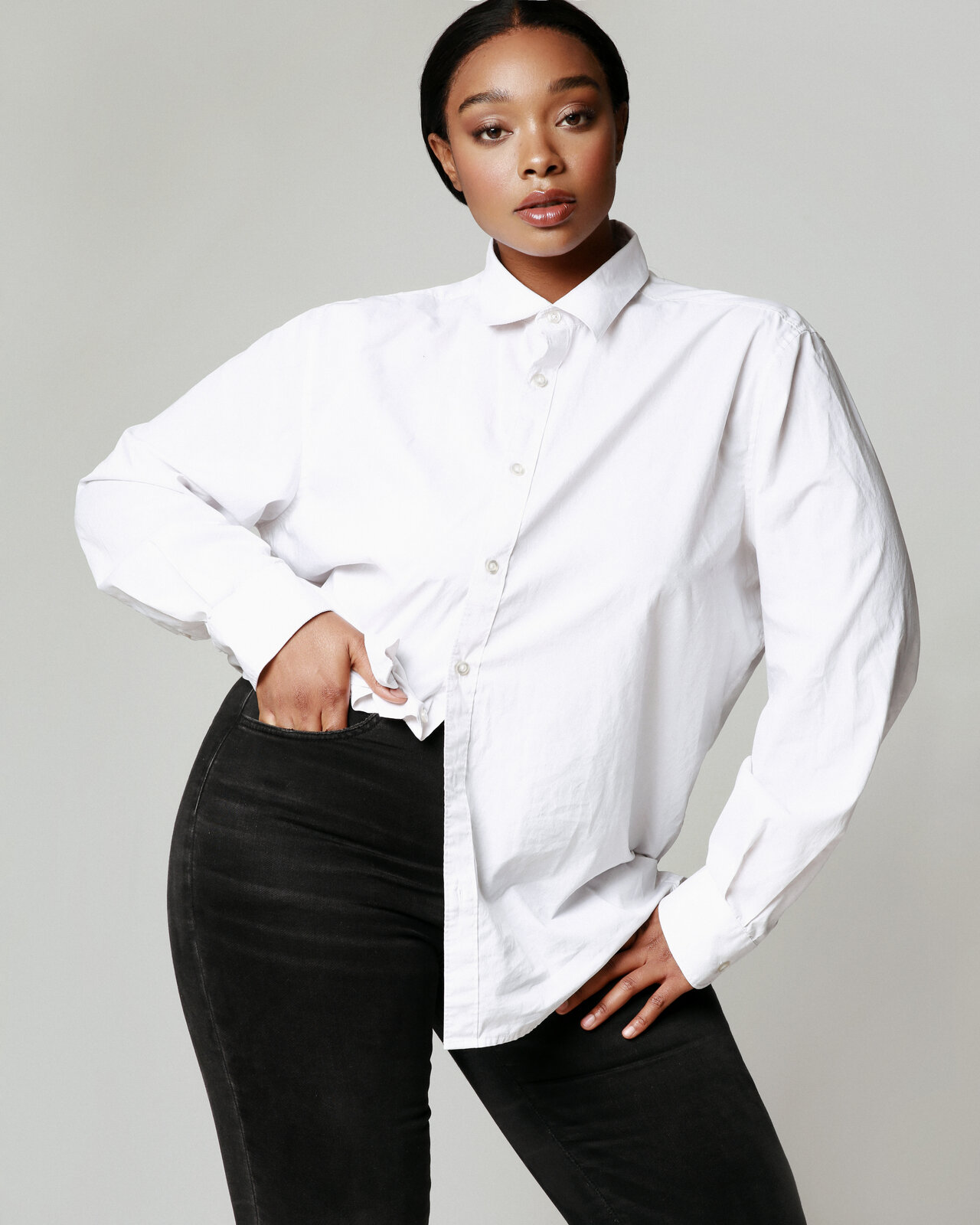 White shirt and black denim, studio